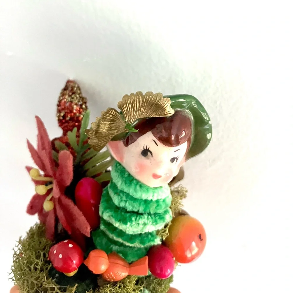 Vintage elf in a troll head handmade Christmas diorama vignette assemblage